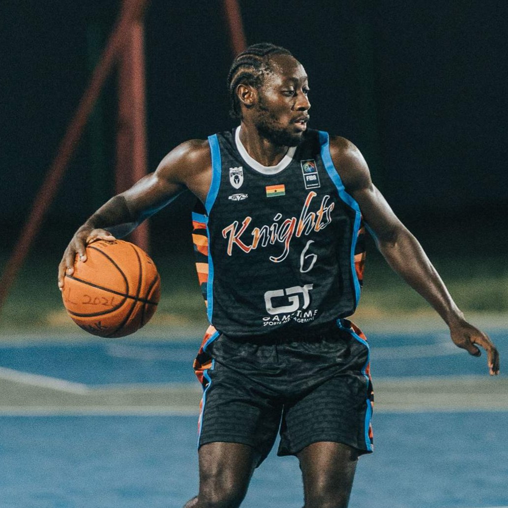 Treasure Botchway in control of the ball in an Accra Basketball League game featuring Spintex Knights and Ghana Navy
